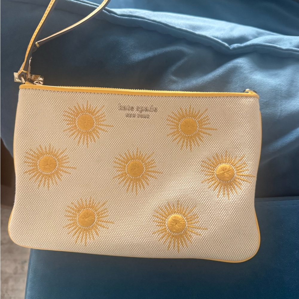 Kate Spade White and Yellow Sun Pattern Wristlet